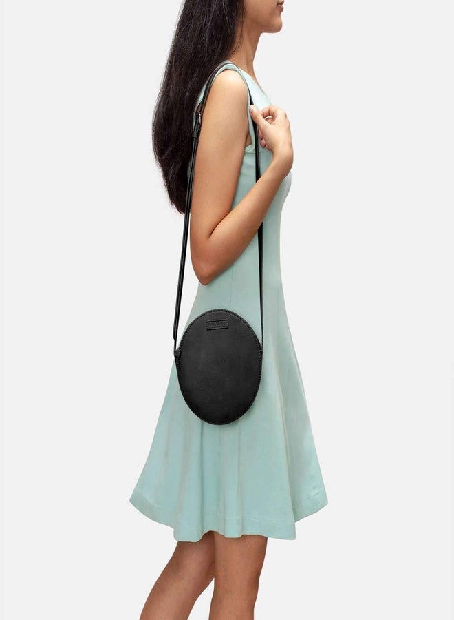 DailyObjects Orbis Round Sling Crossbody Bag For Women| Stylish Solid Black Faux Leather Purse With Slip Pocket & 2 Compartments Inside| Zip Closure & Adjustable Strap| Storage Space For Essentials - Image 2